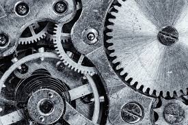 Image of mechanical gears representing skills (Saber hacer)